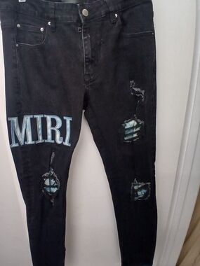 AMIRI Black Skinny Jeans with Light Blue Patch Details
